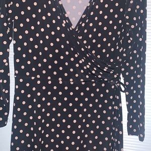Petite sophisticated size PM black dress with brown polka dots.